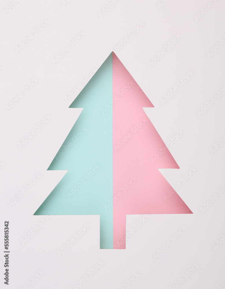 Christmas tree cut out of paper hole Christmas tree cut out of paper hole