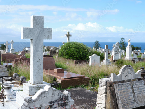 Cemetery with cross sculptures and grave stones