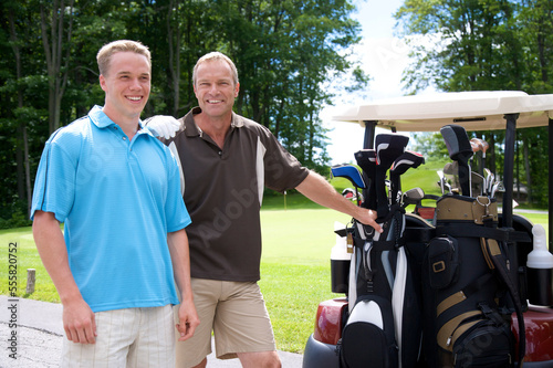 Men Standing by Golf Cart, Burlington, Ontario, Canada photo