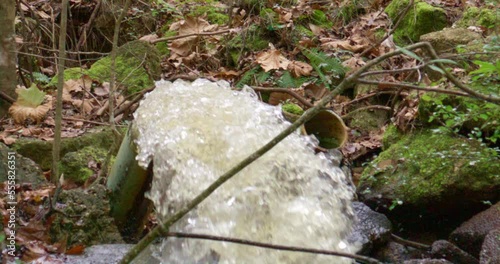 Water coming out of pipe in Slow motion photo