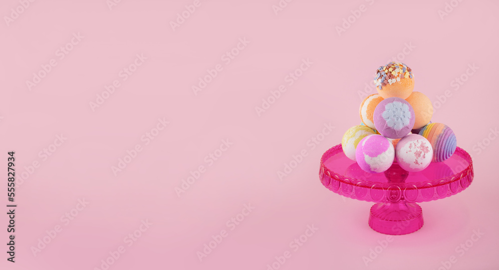 Stop motion bath bombs on a pink tray pink background Horizontal frame with space for text Horizontal Banner