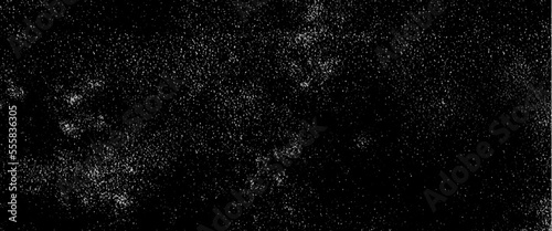 Flying dust particles on a black background, abstract real dust floating over black background for overlay, night sky graphic resources star on snow effect background 

