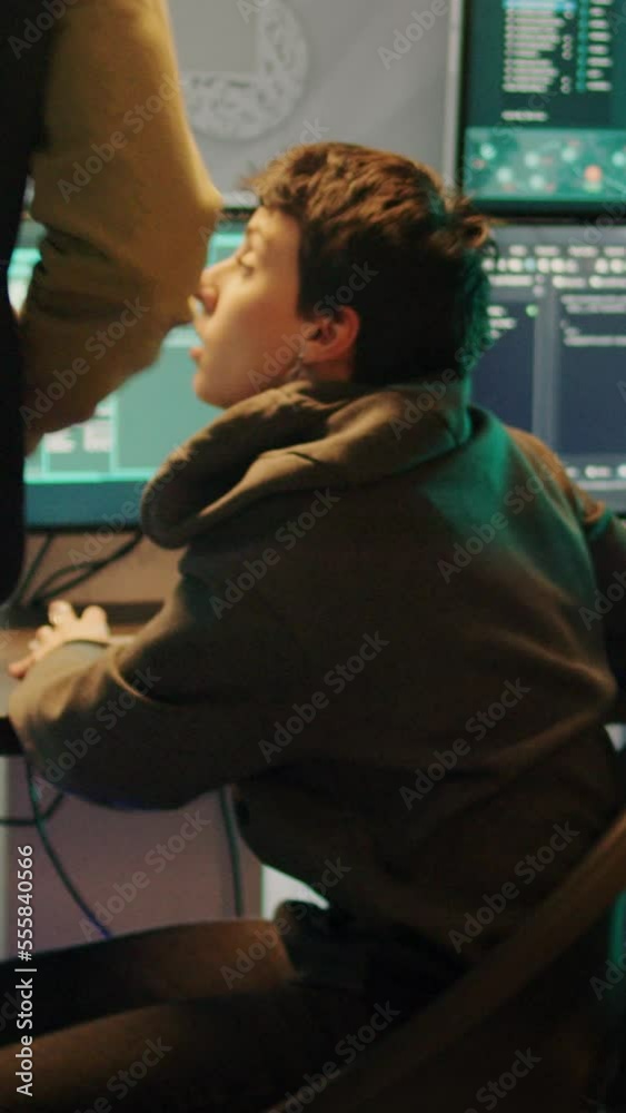 Vertical video: Cyber criminals using trojan virus to hack computer system, trying to steal data and passwords. Team of spies committing hacktivism and identity theft, making threats at night. Vertical video: Cyber criminals using trojan virus to hack computer system, trying to steal data and passwords. Team of spies committing hacktivism and identity theft, making threats at night.