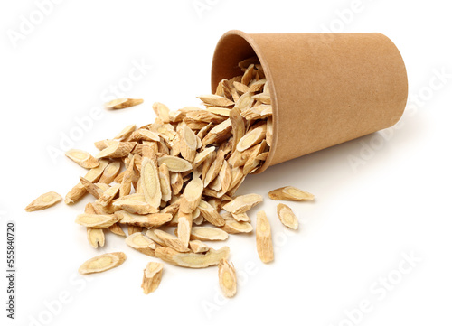 Chinese Herbal medicine - Astragalus slices, Huang Qi (Astragalus propinquus) on white background  photo
