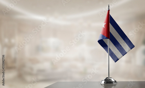 Photography A small Cuba flag on an abstract blurry background