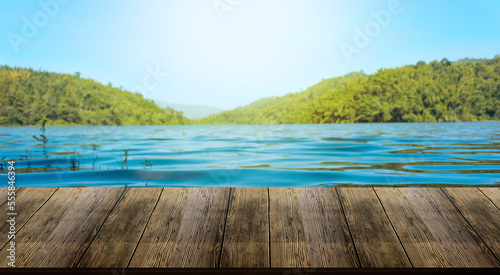 beautiful wood floor and sky grass mountain river background