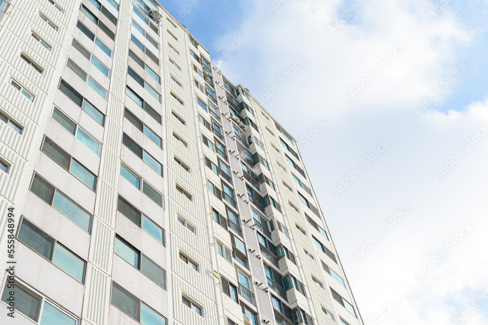 A tall apartment that is generally inhabited by Koreans A tall apartment that is generally inhabited by Koreans