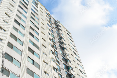 A tall apartment that is generally inhabited by Koreans