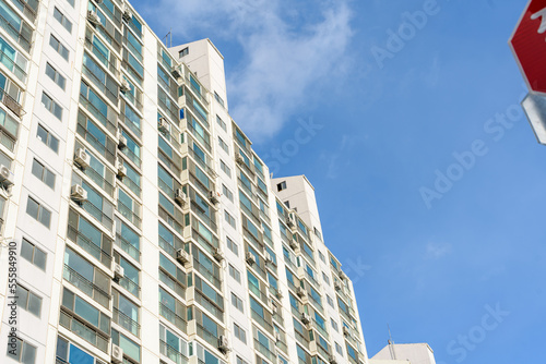 A tall apartment that is generally inhabited by Koreans
