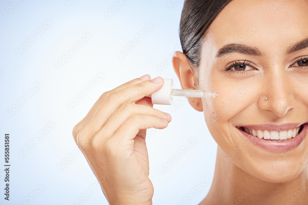 Face portrait, skincare and woman with serum in studio on a mock up background. Wellness, facial cosmetics and female model with essential oil, hyaluronic acid and product for skin health and beauty. Face portrait, skincare and woman with serum in studio on a mock up background. Wellness, facial cosmetics and female model with essential oil, hyaluronic acid and product for skin health and beauty.