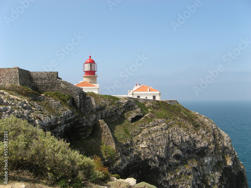 Lighthouse on Cape Saint Wincenty on a sunny summer day, Algarve, Portugal photo