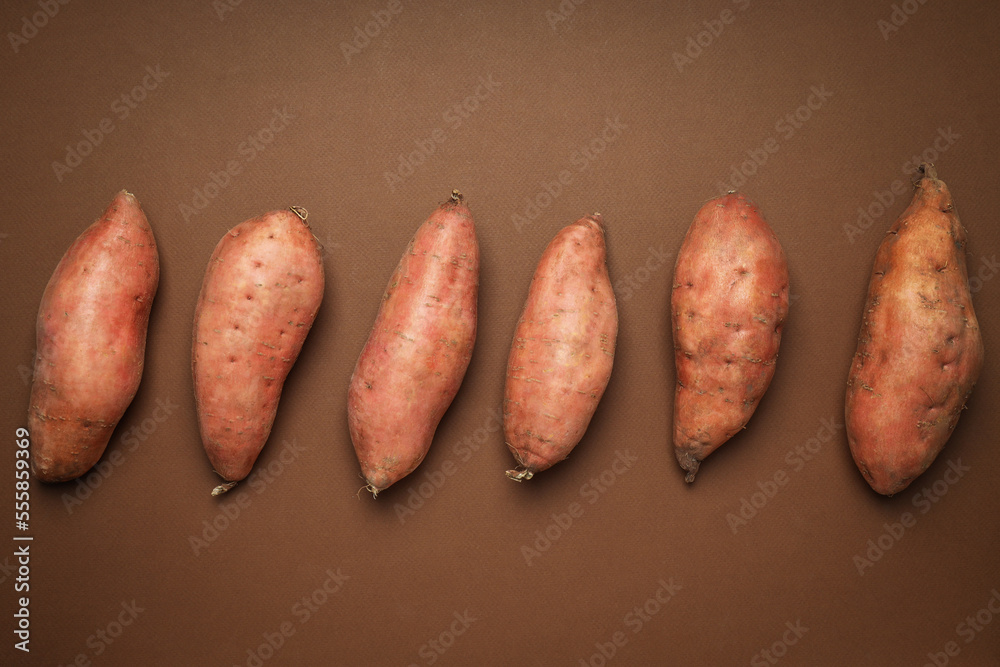 Concept of vegetables, sweet potato, top view Concept of vegetables, sweet potato, top view