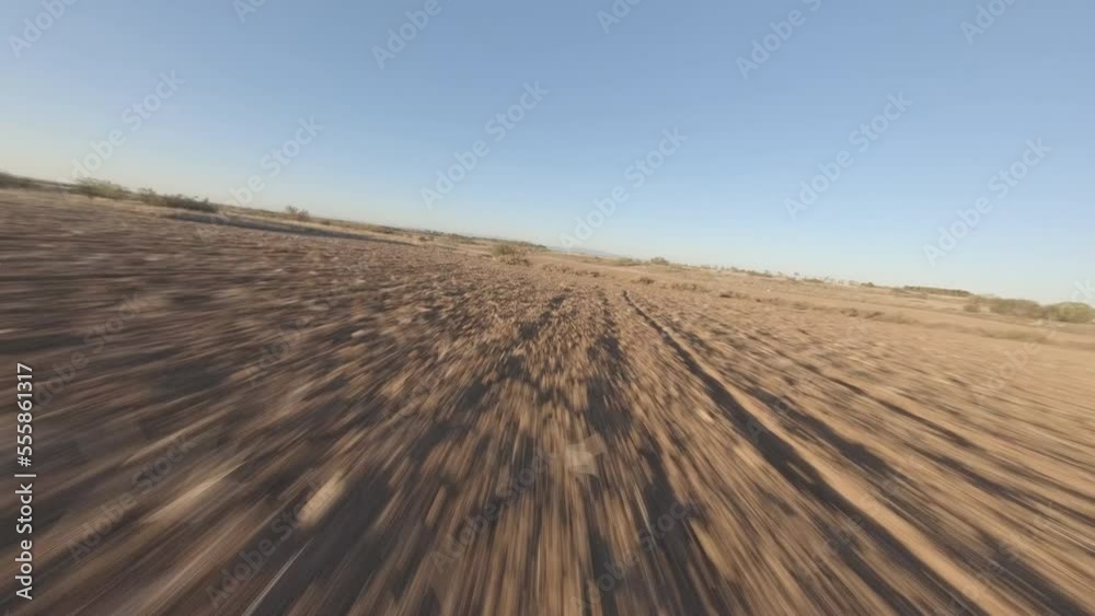 Incredible fast FPV aerial drone flying above dry summer Spanish coutryside Incredible fast FPV aerial drone flying above dry summer Spanish coutryside