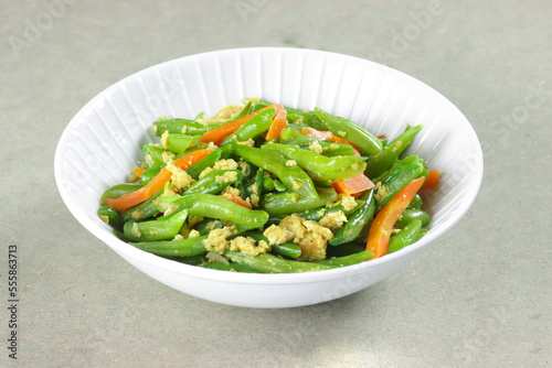 Orak Arik Buncis or Scrambled green beans or snap beans or string beans and carrot with omelette.