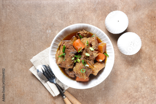 Galbijjim or KalbijJim is Korean Traditional Braised Beef Short Ribs Dish in a Rich Sauce.