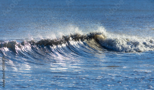 foamy crests of waves