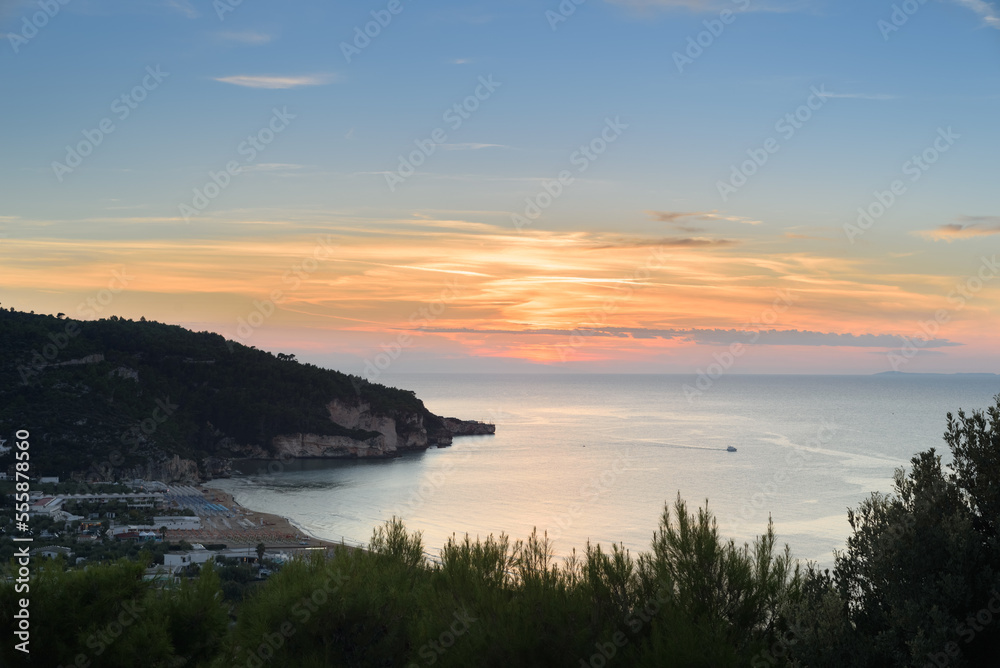 Peschici, Italy. Panoramic view of the Bay of Peschici at sunset. September 6, 2022.