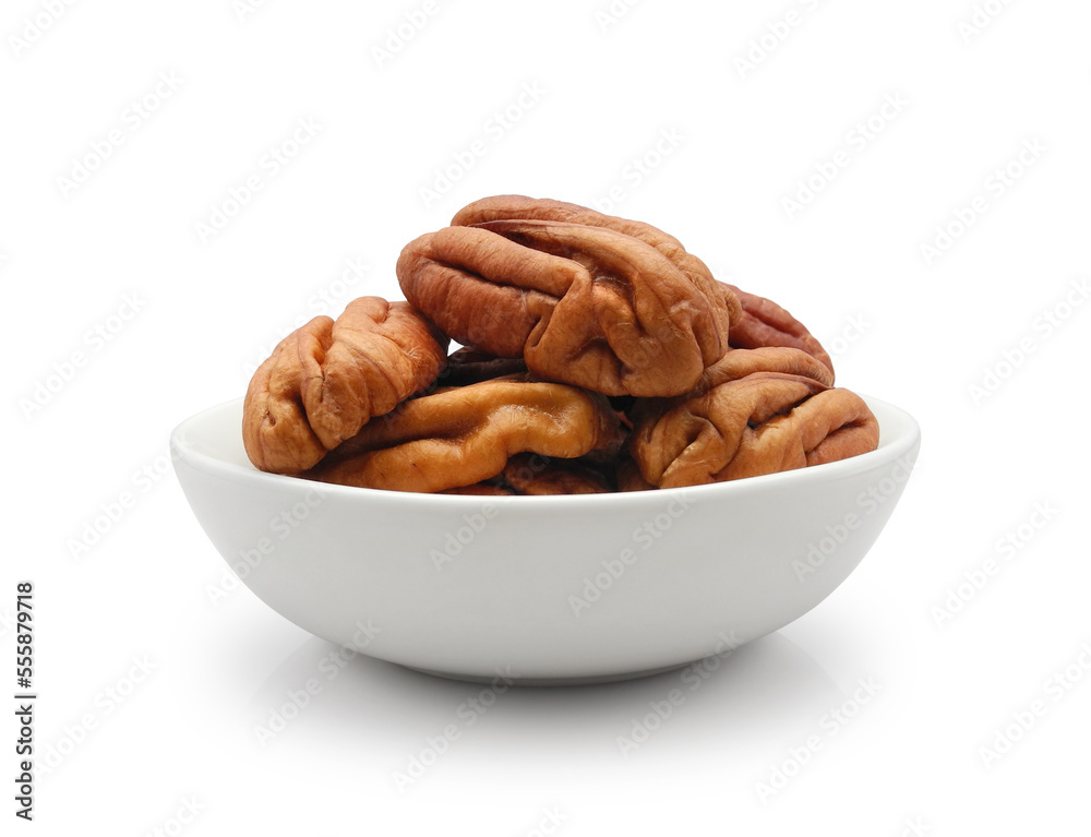 Pecan nuts in ceramic bowl isolated on white background Pecan nuts in ceramic bowl isolated on white background