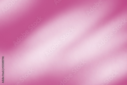 Trendy color of 2023. Blurred abstract background toned in color of year. Shadows and light on wall. Space for text.
