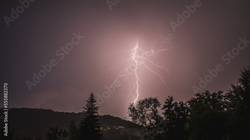 Storm clouds and lightning over the countryside