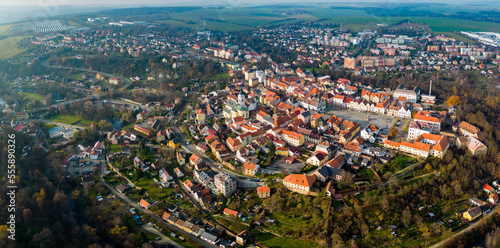 Aerial around the village Stříbro in the Czech Republic on a cloudy day in autumn .