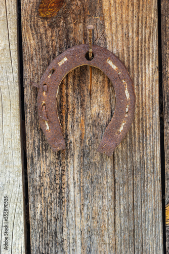 Wood texture background with rusted horseshoe, Old wooden board, background