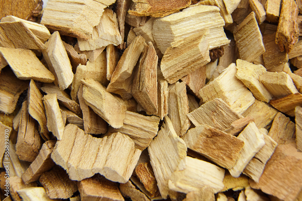 Wood chips for smocking texture background. Natural wood smoking chunks, top view Wood chips for smocking texture background. Natural wood smoking chunks, top view