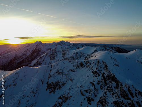 Fagaras mountains covered with snow in golden hour