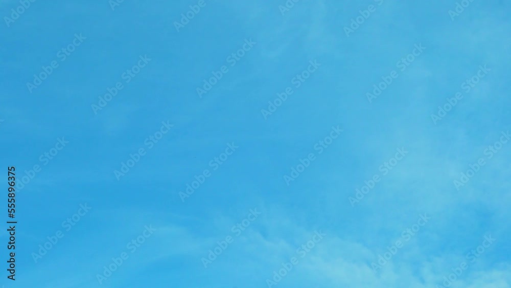 Beautiful View of Clear Azure Sky and Light Clouds Like Feathers Slow Motion Time Lapse. Ozone Layer, Atmosphere, Blue Skies, White Cirrus Clouds, Empyrean, Heaven, Peace, Palate, High, Day, Weather. Beautiful View of Clear Azure Sky and Light Clouds Like Feathers Slow Motion Time Lapse. Ozone Layer, Atmosphere, Blue Skies, White Cirrus Clouds, Empyrean, Heaven, Peace, Palate, High, Day, Weather.