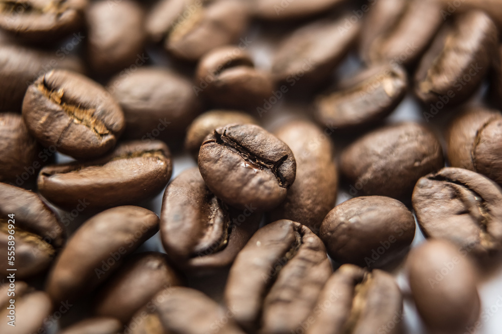 Falling Roasted Coffee Beans, Macro Shot, close-up. Falling Roasted Coffee Beans, Macro Shot, close-up.