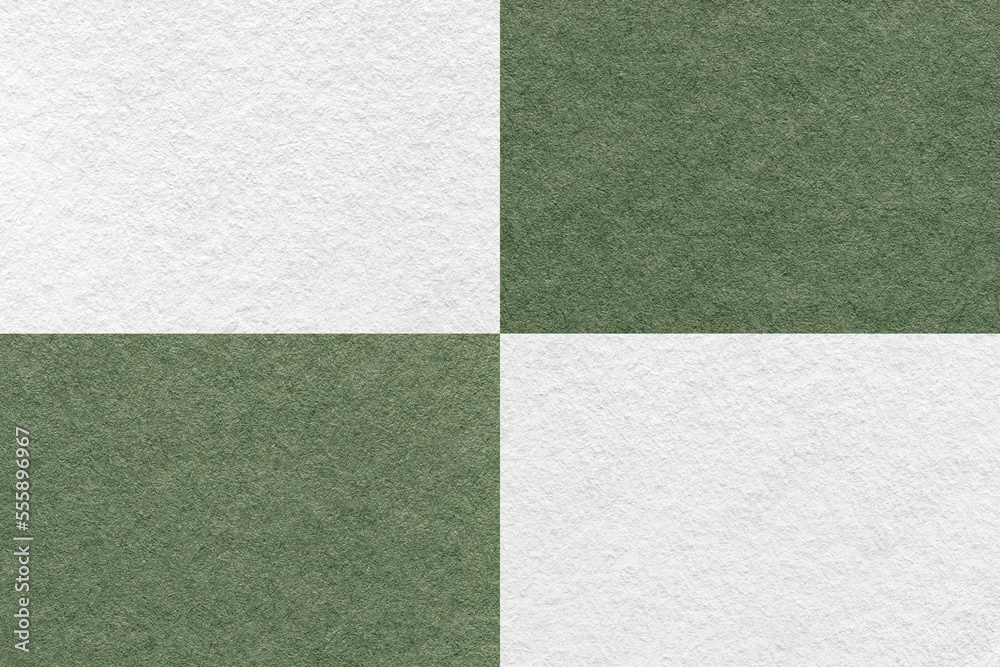 Fototapeta premium Texture of craft white and green paper background with cells pattern, macro. Structure of vintage olive cardboard.