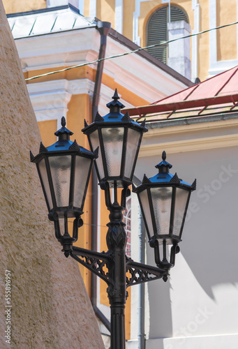 Retro style lamp on street. photo