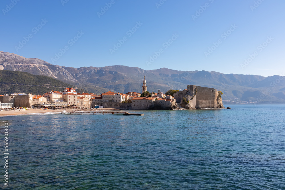 Panoramic view of the medieval old town of the tourist coastal city of Budva, Montenegro, Adriatic Mediterranean Sea, Montenegro, Balkan, Europe. Dinaric Alps along the Budvanian riviera in the back