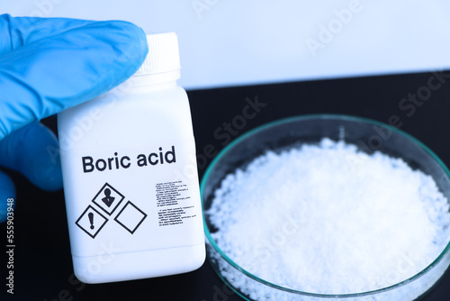 Boric acid in bottle, chemical in the laboratory and industry photo