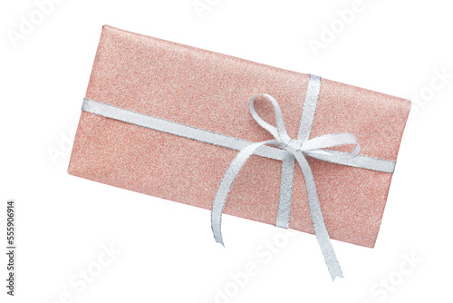 Lame pink present decorated with lame silver ribbon seen from overhead