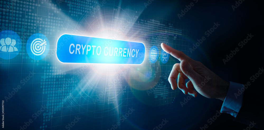 A businessmans hand selecting a Crypto Currency business word concept on a computer display. A businessmans hand selecting a Crypto Currency business word concept on a computer display.