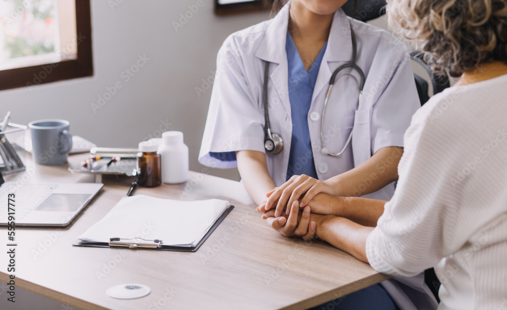 Homecare nursing service and elderly people cardiology healthcare. Close up of young hispanic female doctor nurse check mature caucasian man patient heartbeat using stethoscope during visit