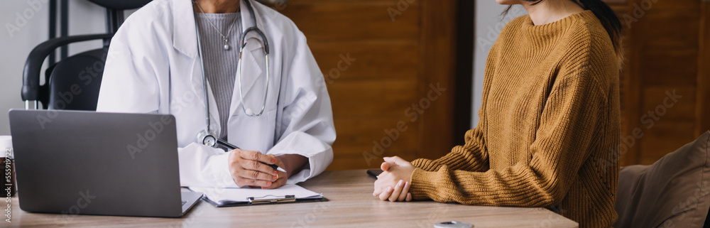 Homecare nursing service and elderly people cardiology healthcare. Close up of young hispanic female doctor nurse check mature caucasian man patient heartbeat using stethoscope during visit Homecare nursing service and elderly people cardiology healthcare. Close up of young hispanic female doctor nurse check mature caucasian man patient heartbeat using stethoscope during visit