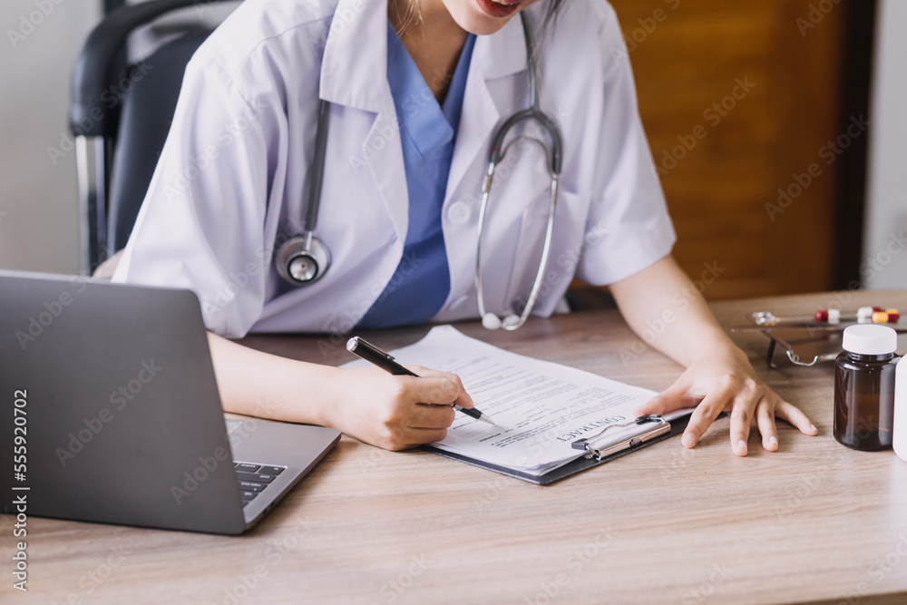 Homecare nursing service and elderly people cardiology healthcare. Close up of young hispanic female doctor nurse check mature caucasian man patient heartbeat using stethoscope during visit Homecare nursing service and elderly people cardiology healthcare. Close up of young hispanic female doctor nurse check mature caucasian man patient heartbeat using stethoscope during visit