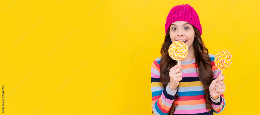 happy kid girl hold lollipop sweet, carefree. Teenager child with sweets, poster banner header, copy space. happy kid girl hold lollipop sweet, carefree. Teenager child with sweets, poster banner header, copy space.