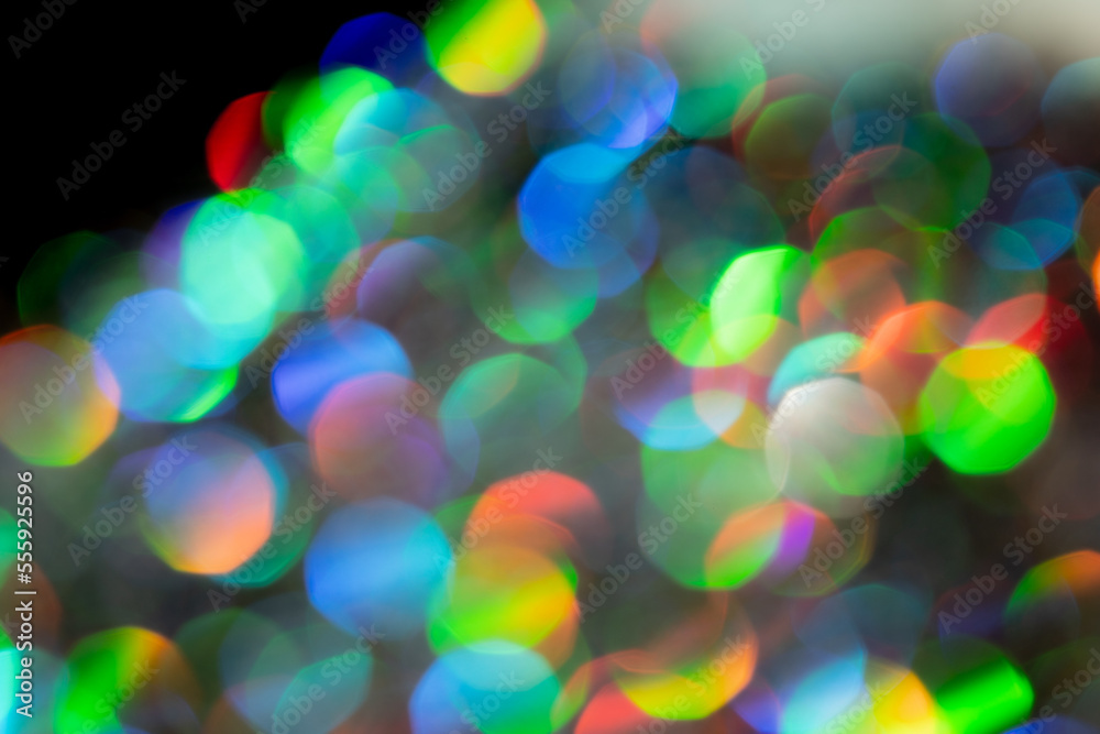 Naklejka premium 黒背景にカラフルな玉ボケ