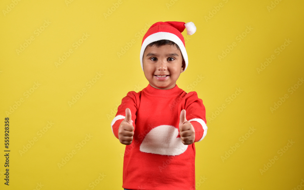 child boy wearing santa cap child boy wearing santa cap