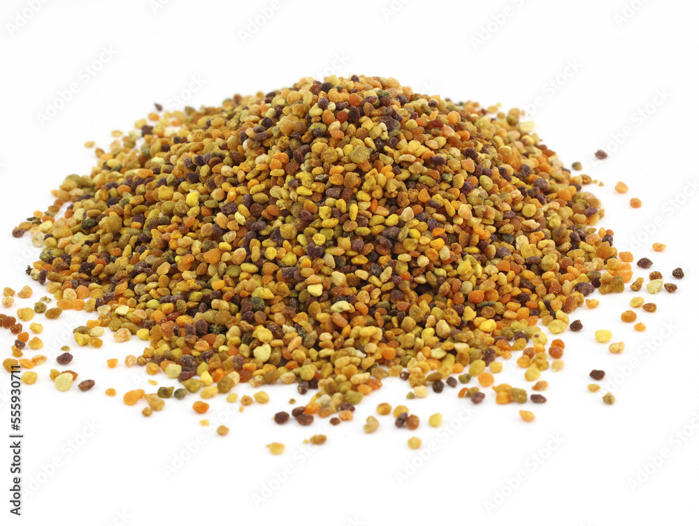 Flower pollen grains or bee bread. Pile of bee pollen or perga on white background top view. Healthy vegetarian food supplement.