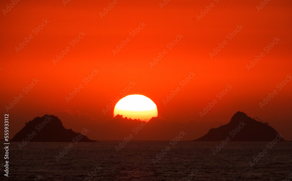 Beautiful sunset sunrise over islands sea