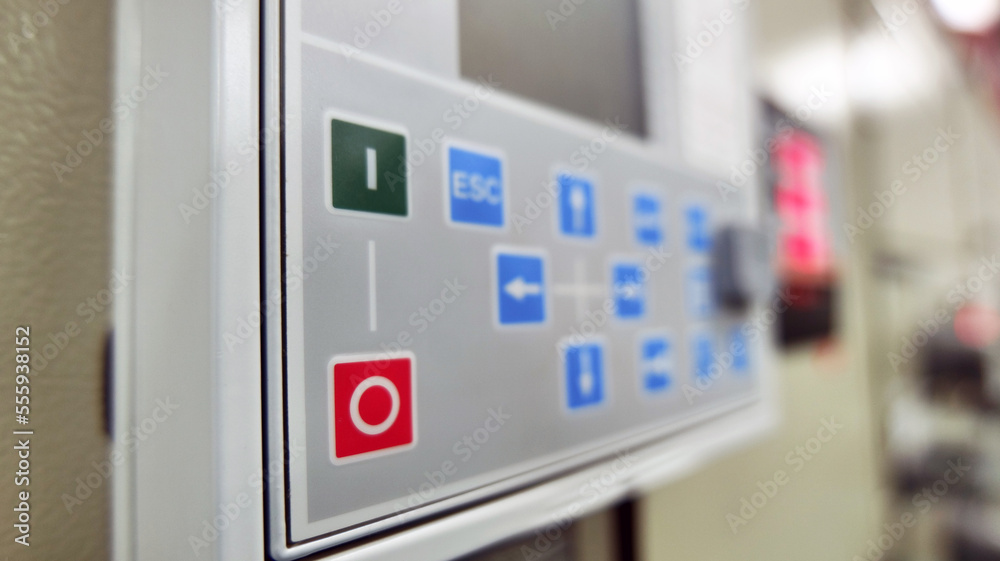 Control buttons and light indicating the work status installed in front of the electric control cabinet installed in the electric control room. Automatic Industry Concept Energy and industrial use