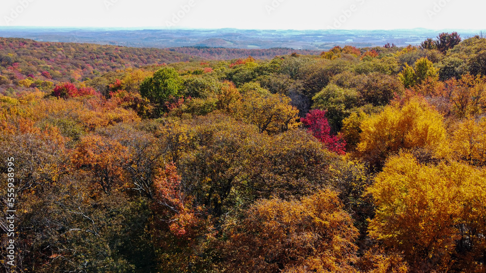 Fall colors surround Beams Rock at Linn Run State Park in Ligonier, Pennsylvania. 