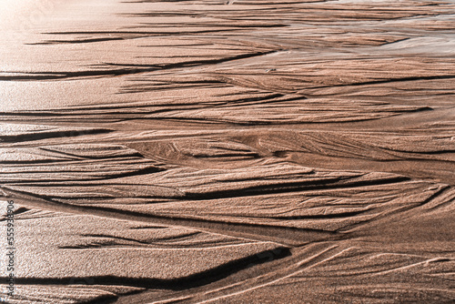 Sand structures, trickles, coombs, creeks and ravines at low tide, seems like another planet landscape photo