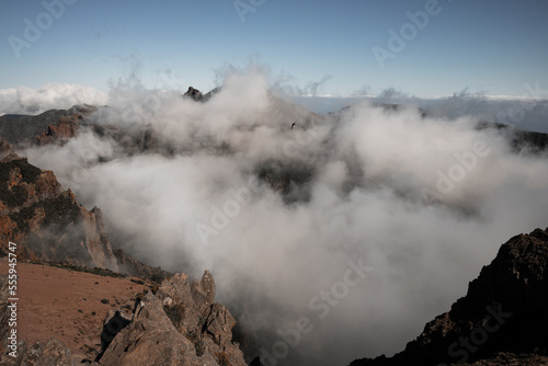 Cloud inversion covering the mountains on the trail from Pico do Arieiro to Pico Ruivo in Madeira island, Portugal