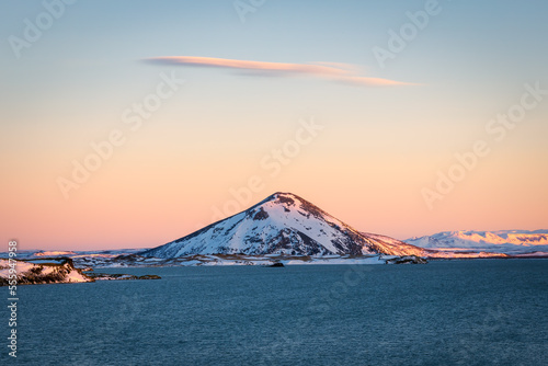 Natural winter landscape of Myvatn lake with Vindbelgjarfjall mountain in Iceland