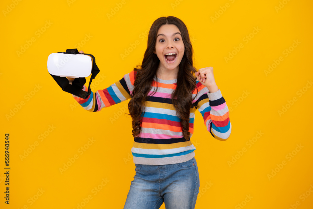 Virtual gadgets for kids, free time and study. Teenage girl uses vr glasses, isolated on yellow background. Happy teenager, positive and smiling emotions of teen girl. Virtual gadgets for kids, free time and study. Teenage girl uses vr glasses, isolated on yellow background. Happy teenager, positive and smiling emotions of teen girl.